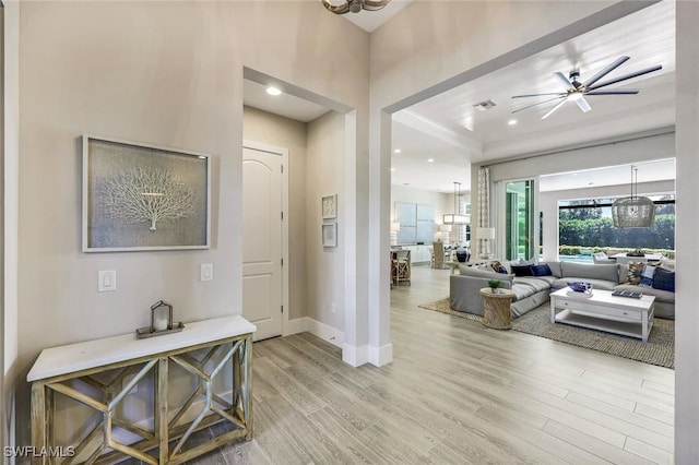 entrance foyer with visible vents, recessed lighting, light wood-type flooring, and baseboards