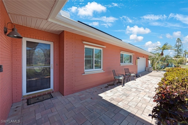 view of patio / terrace with a garage