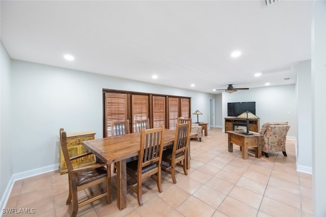 dining area featuring light tile patterned floors, recessed lighting, a ceiling fan, and baseboards