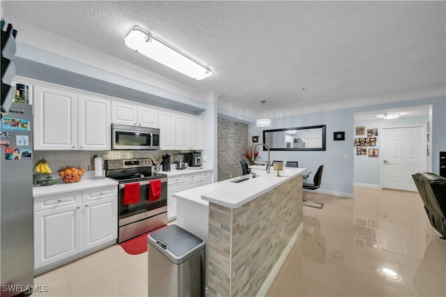 11510 Villa Grand Unit 408, Fort Myers, FL 33913 - kitchen featuring white cabinetry, light countertops, stainless steel appliances, a sink, and light tile patterned flooring
