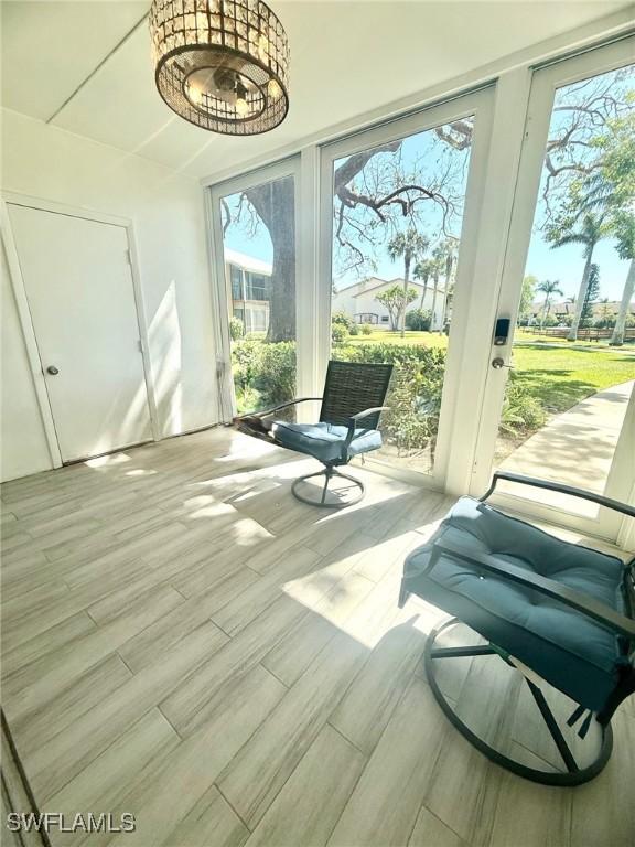 interior space with wood finished floors and a wealth of natural light