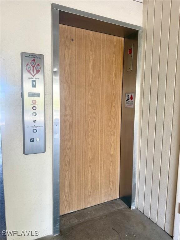 interior details with elevator and concrete floors