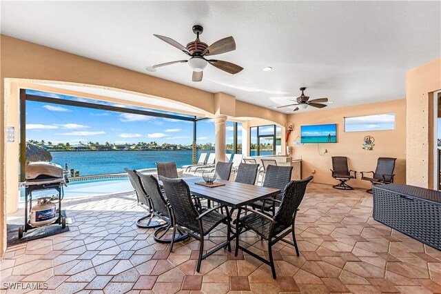 416 SW 52nd St, Cape Coral, FL 33914 - view of patio / terrace featuring ceiling fan and outdoor dining space
