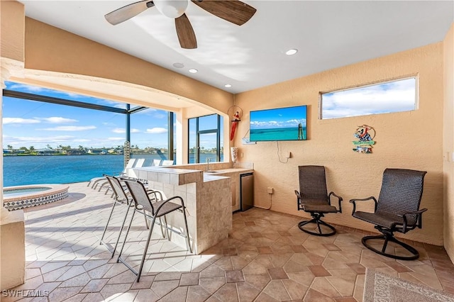 416 SW 52nd St, Cape Coral, FL 33914 - interior space featuring light tile patterned floors, ceiling fan, recessed lighting, and a textured wall