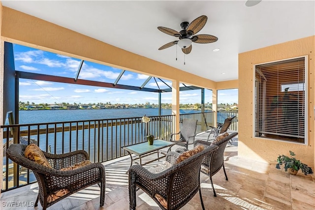 416 SW 52nd St, Cape Coral, FL 33914 - view of patio featuring a lanai, a ceiling fan, and a water view
