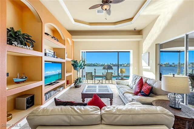 416 SW 52nd St, Cape Coral, FL 33914 - living area featuring built in features, visible vents, a healthy amount of sunlight, and ceiling fan
