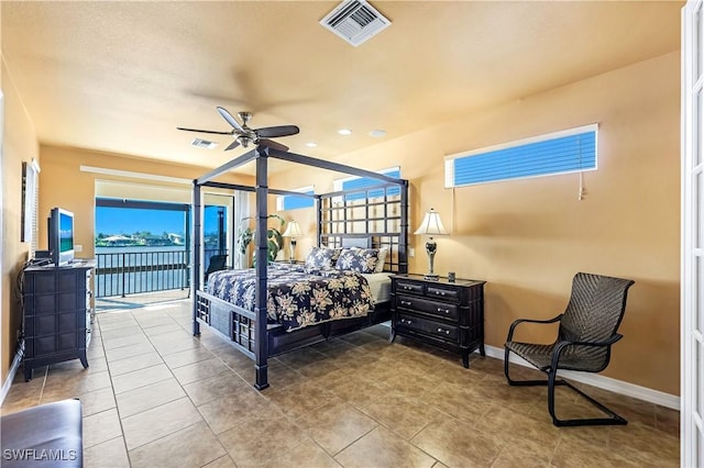 416 SW 52nd St, Cape Coral, FL 33914 - tiled bedroom with access to outside, baseboards, and visible vents