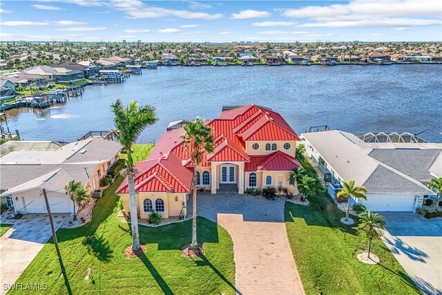416 SW 52nd St, Cape Coral, FL 33914 - birds eye view of property featuring a water view and a residential view