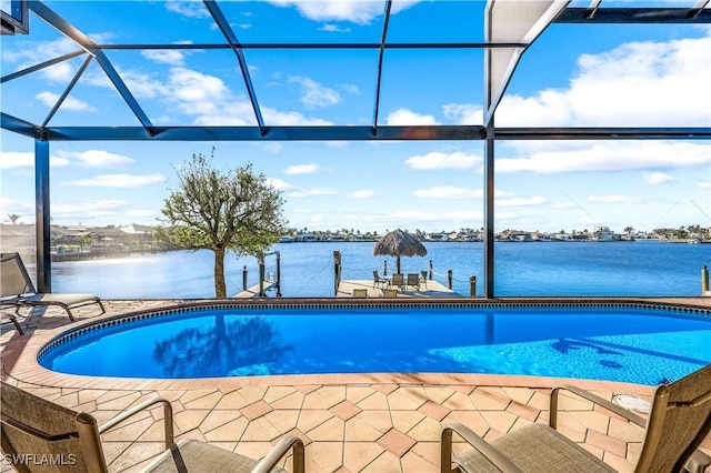 416 SW 52nd St, Cape Coral, FL 33914 - pool with glass enclosure, a water view, and a patio