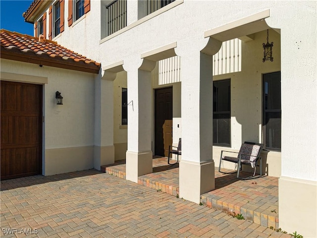 view of patio / terrace with a garage