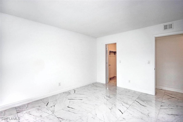 601 Periwinkle Way Unit D1, Sanibel, FL 33957 - interior space featuring visible vents, marble finish floor, a closet, baseboards, and a spacious closet