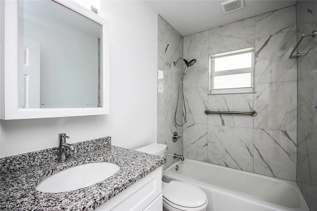 601 Periwinkle Way Unit D1, Sanibel, FL 33957 - full bath with visible vents, toilet, vanity, and shower / bathing tub combination