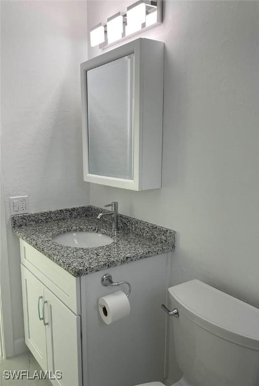 601 Periwinkle Way Unit D1, Sanibel, FL 33957 - half bath with toilet and vanity