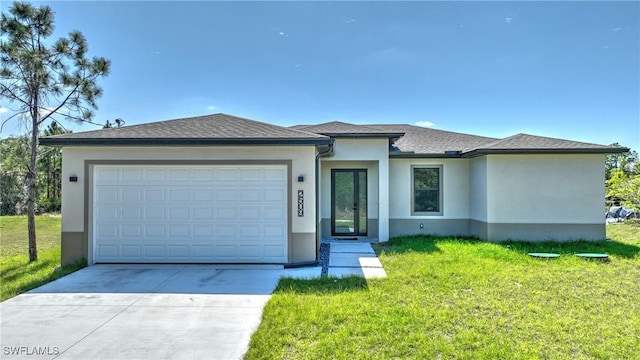 3204 69th St W, Lehigh Acres, FL 33971 - prairie-style house featuring driveway, a garage, a front yard, roof with shingles, and stucco siding