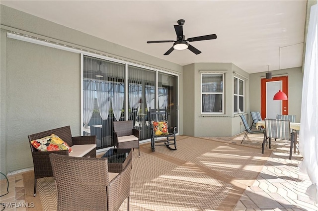 view of patio / terrace featuring a ceiling fan