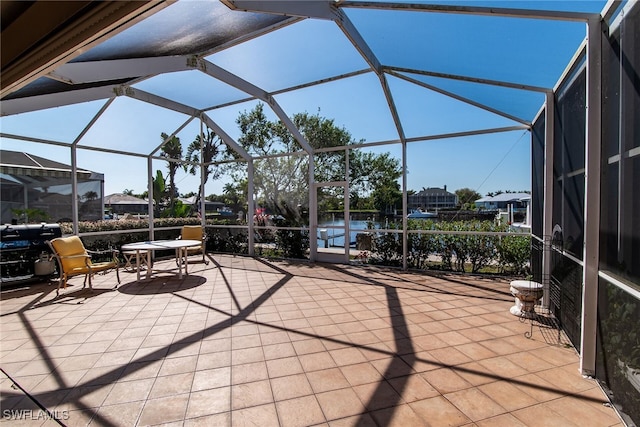 view of patio / terrace with glass enclosure