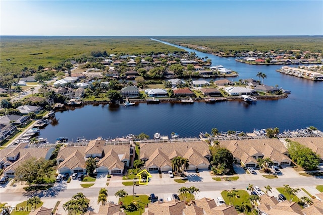 aerial view featuring a water view and a residential view