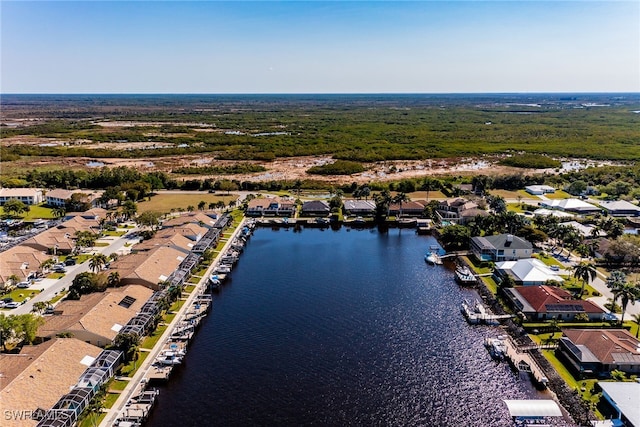 aerial view featuring a residential view and a water view