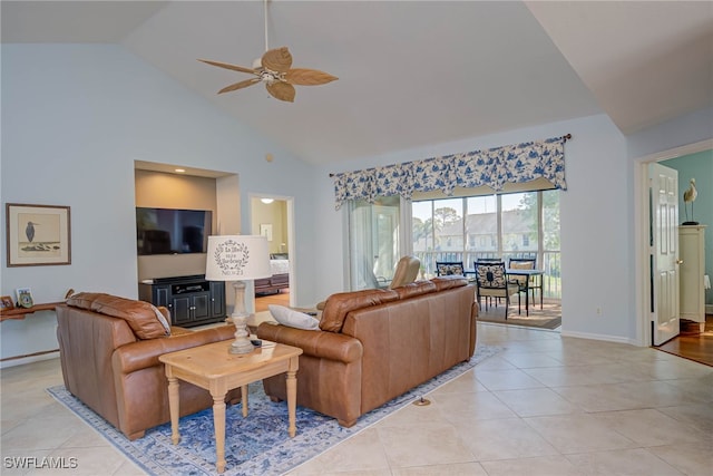 living room with high vaulted ceiling, light tile patterned floors, baseboards, and ceiling fan