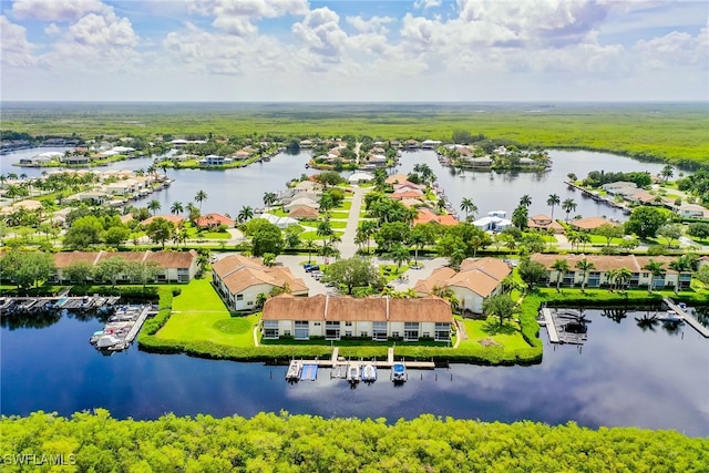 aerial view with a residential view and a water view