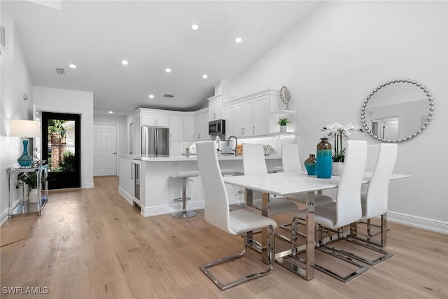 dining area featuring recessed lighting, visible vents, baseboards, and light wood finished floors