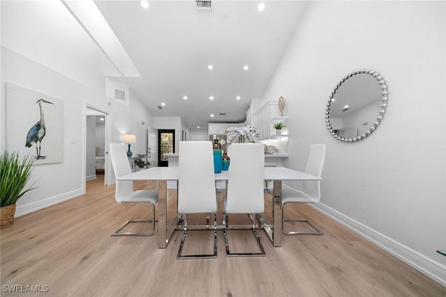 dining area with visible vents, recessed lighting, baseboards, and light wood-style floors