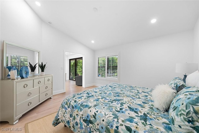 bedroom featuring recessed lighting, light wood-style flooring, high vaulted ceiling, and baseboards