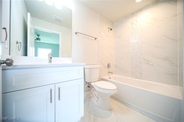 bathroom featuring toilet, marble finish floor,  shower combination, ceiling fan, and vanity