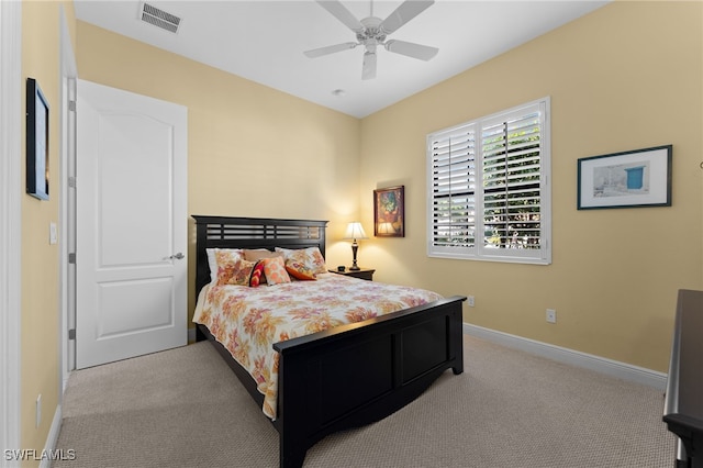 bedroom with visible vents, a ceiling fan, carpet, and baseboards