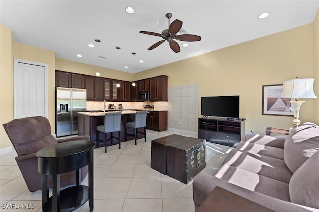 living room featuring light tile patterned floors, recessed lighting, and ceiling fan