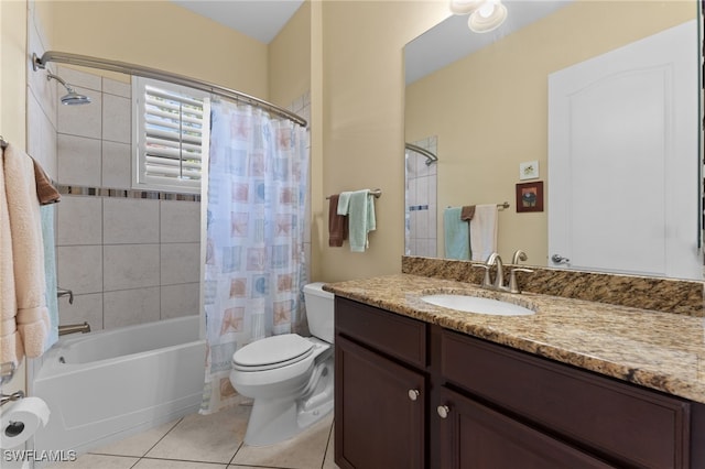 bathroom featuring vanity, tile patterned floors, toilet, and shower / bath combo