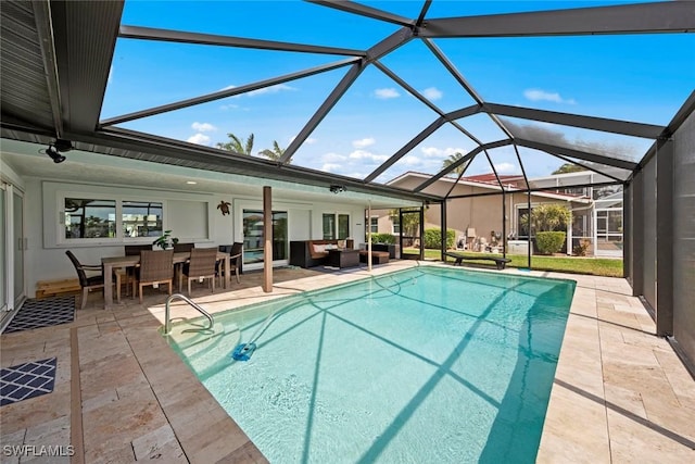 pool featuring a patio area, outdoor dining space, glass enclosure, and outdoor lounge area