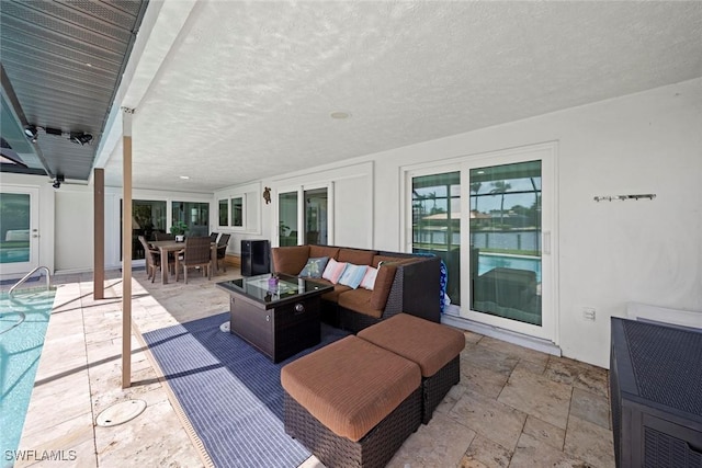 view of patio / terrace featuring outdoor dining space and an outdoor hangout area