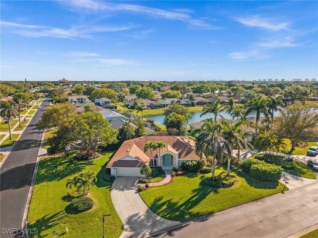 aerial view with a water view and a residential view