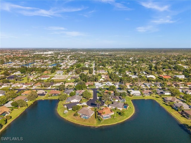 bird's eye view featuring a residential view and a water view