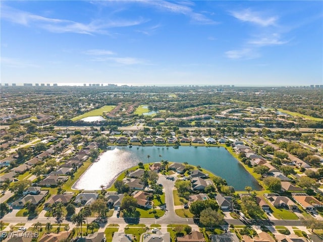 bird's eye view with a water view and a residential view