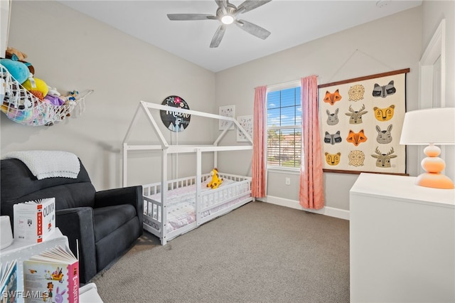 bedroom with baseboards, a ceiling fan, and carpet flooring