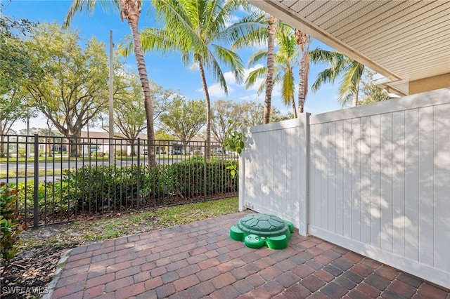 view of patio with fence