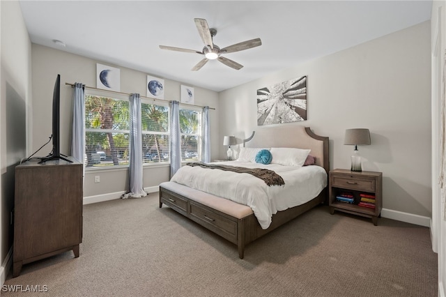 bedroom featuring carpet flooring, baseboards, and ceiling fan