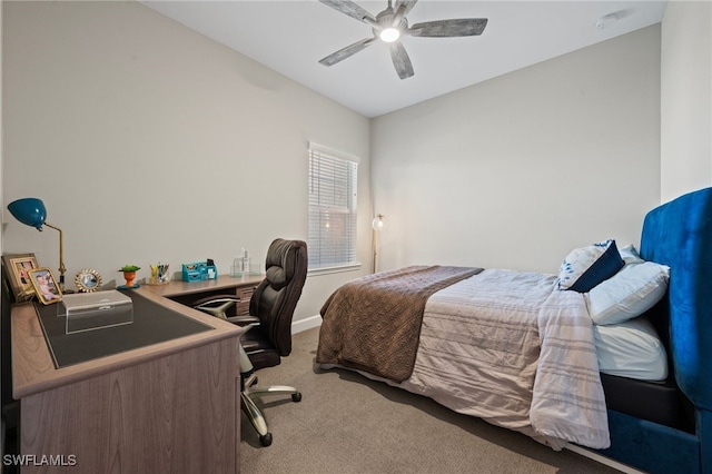 bedroom featuring light carpet, baseboards, and a ceiling fan