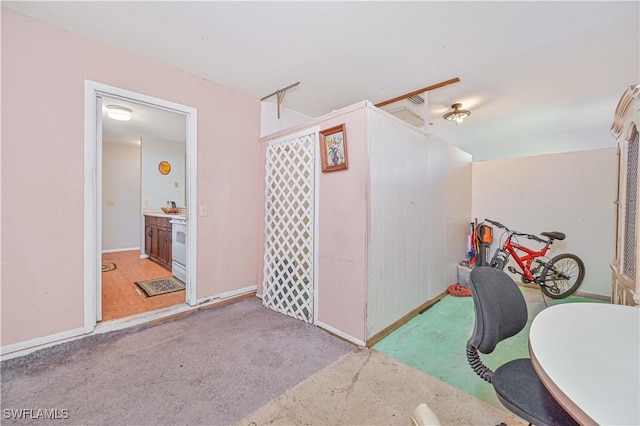 game room with baseboards and carpet