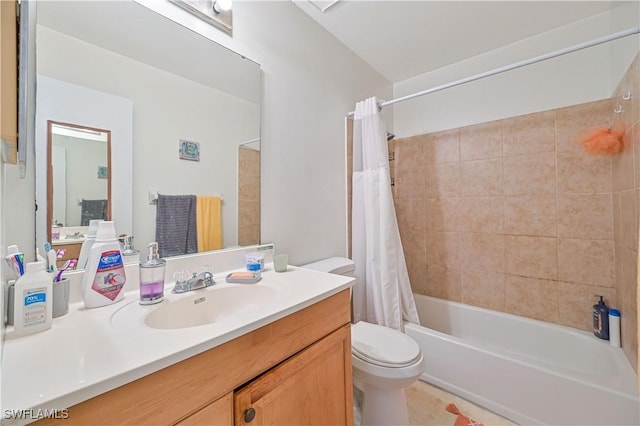 bathroom with toilet, vanity, and shower / bath combo