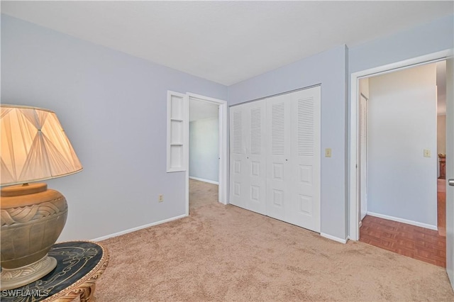 interior space featuring baseboards