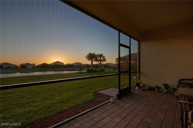 view of patio / terrace with a water view