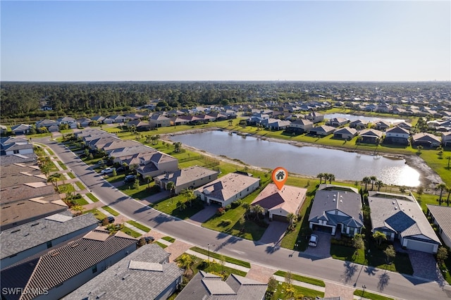 aerial view featuring a residential view and a water view