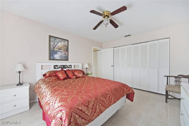 bedroom with light tile patterned flooring, visible vents, and ceiling fan