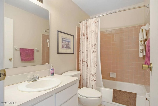 full bath with vanity, toilet, and shower / tub combo with curtain