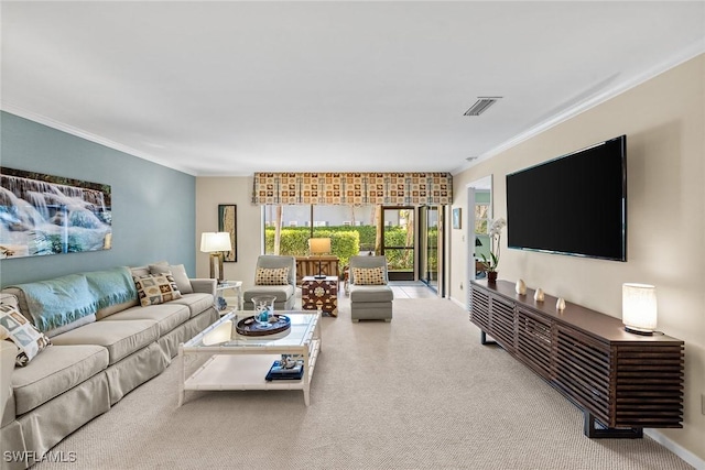 carpeted living area with crown molding, baseboards, and visible vents