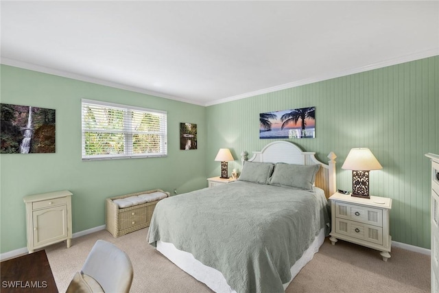 bedroom with light carpet, baseboards, and ornamental molding