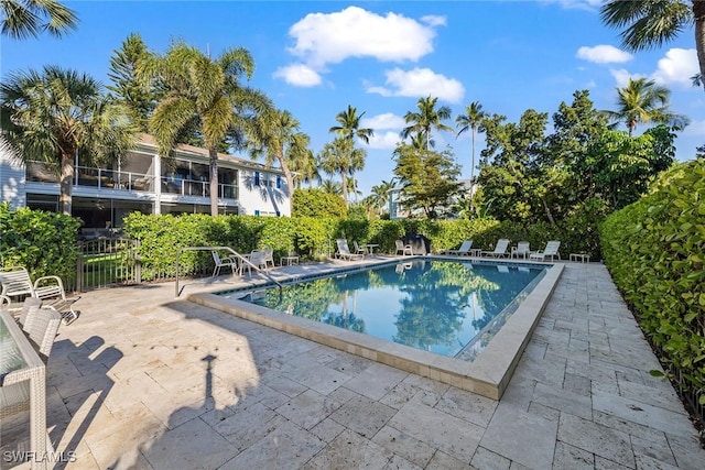 community pool featuring a patio